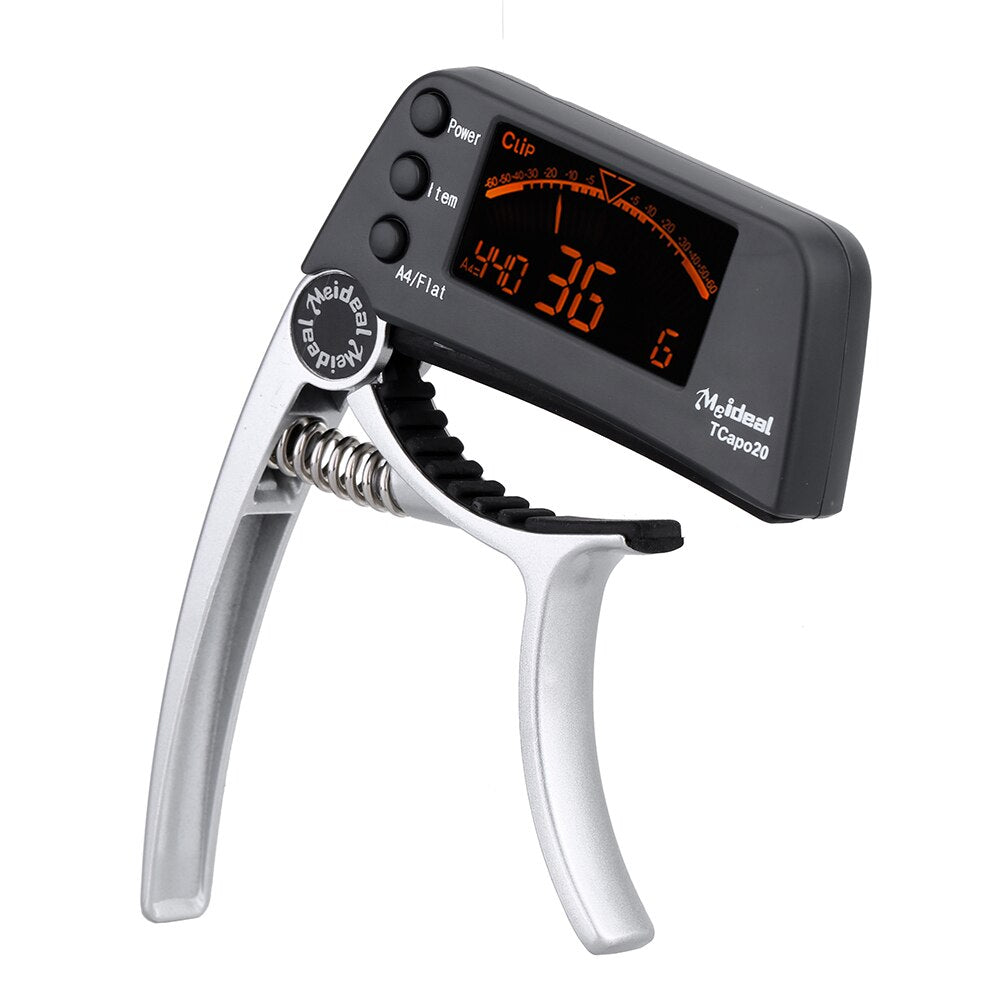 Capo & Tuner "TuneGrip" – 2-i-1 gitar tilbehør med LCD-skjerm | Skanto