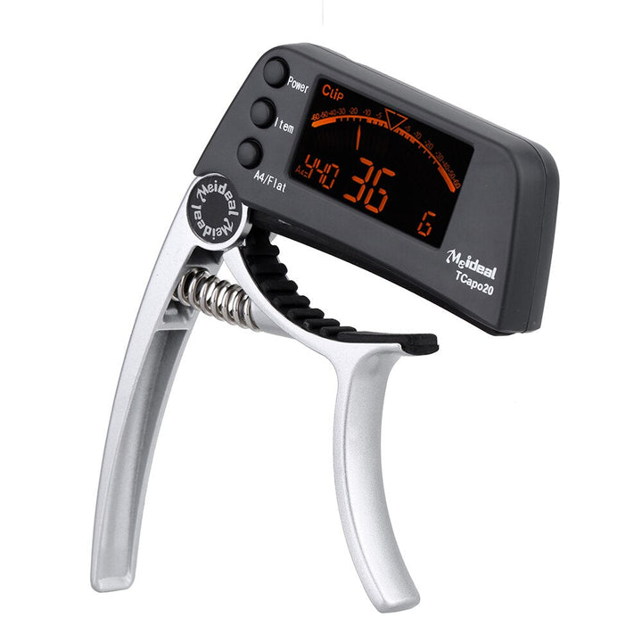 Capo & Tuner "TuneGrip" – 2-i-1 gitar tilbehør med LCD-skjerm | Skanto
