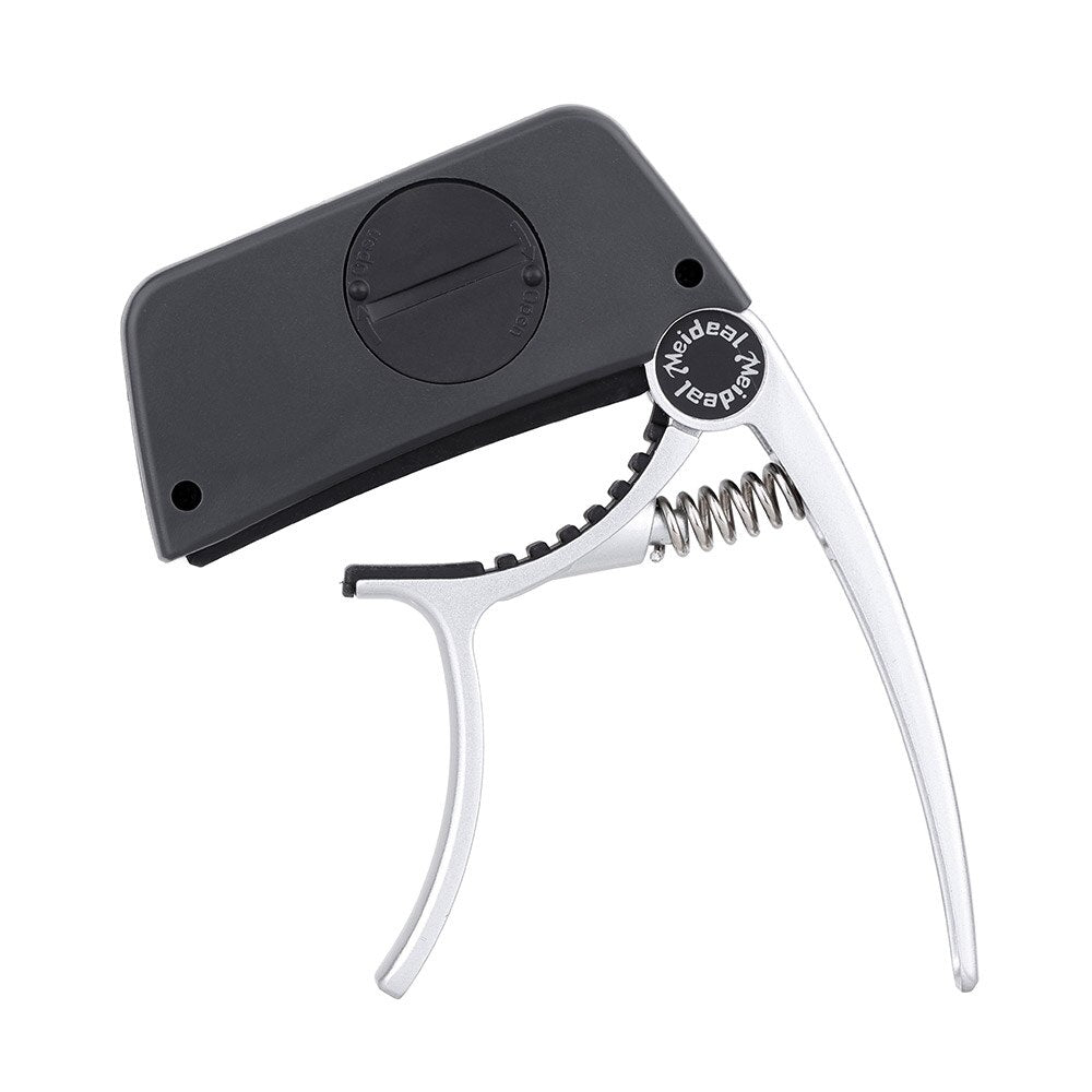 Capo & Tuner "TuneGrip" – 2-i-1 gitar tilbehør med LCD-skjerm | Skanto