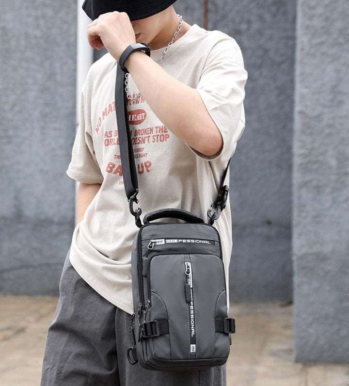 Skanto | Vanntett Oxford Crossbody Bag, Tyverisikkert Sling Bag, USB Lading & Flerlommes Design
