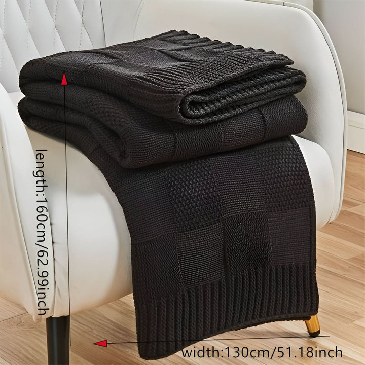Skanto | MONOSTRIPE – Minimalistisk strikket teppe