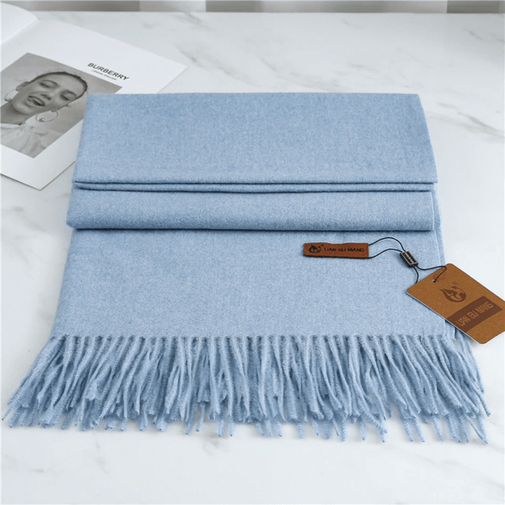 Skanto | Cashmere skjerf med dusker for varme og eleganse