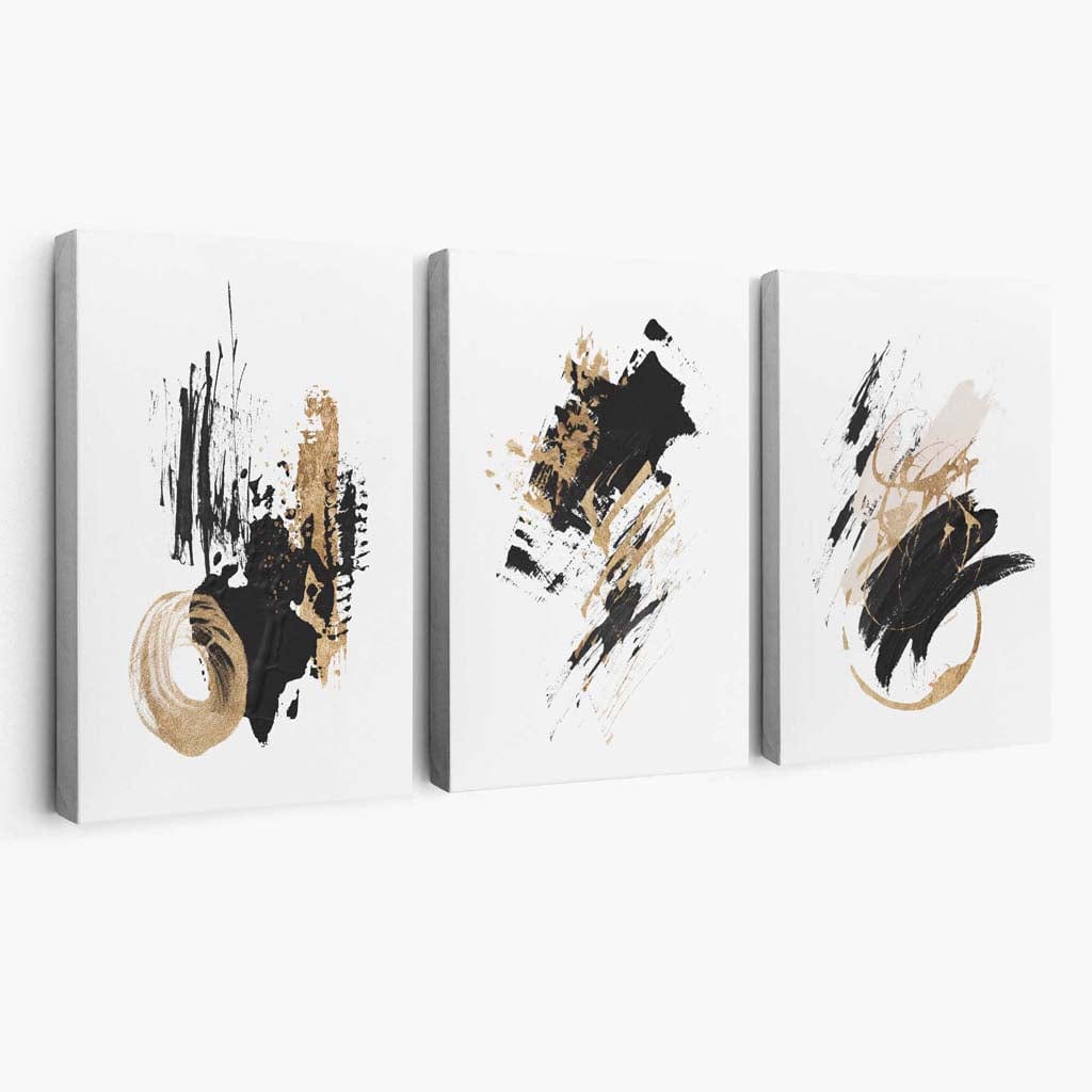 Abstrakt sett med 3 minimalistiske lerretsmalerier i svart og gull