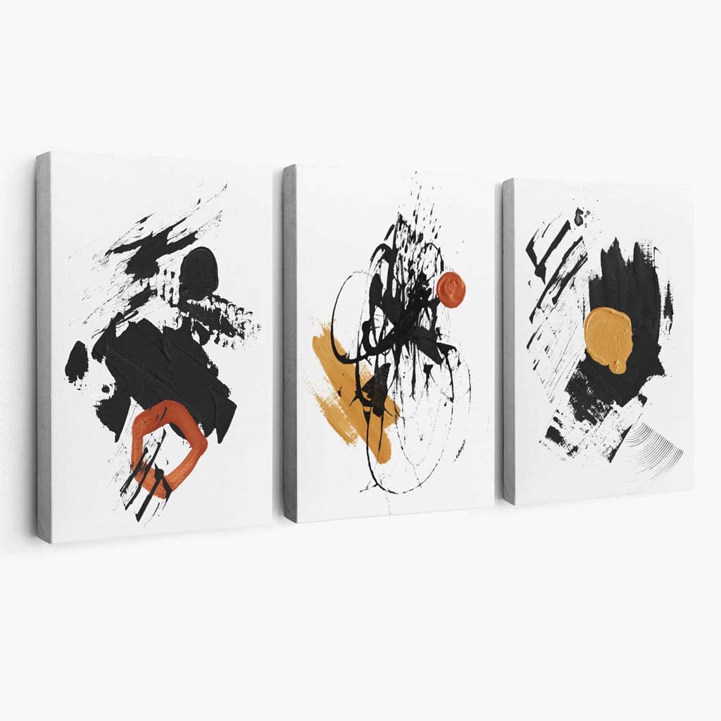 Abstrakt sett med 3 minimalistiske lerretsmalerier i svart, gult og oransje