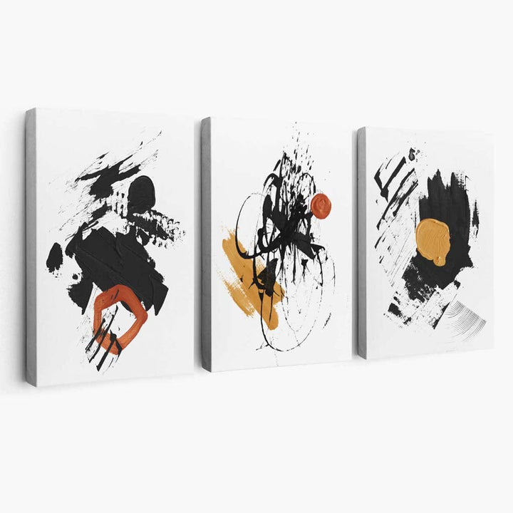 Abstrakt sett med 3 minimalistiske lerretsmalerier i svart, gult og oransje