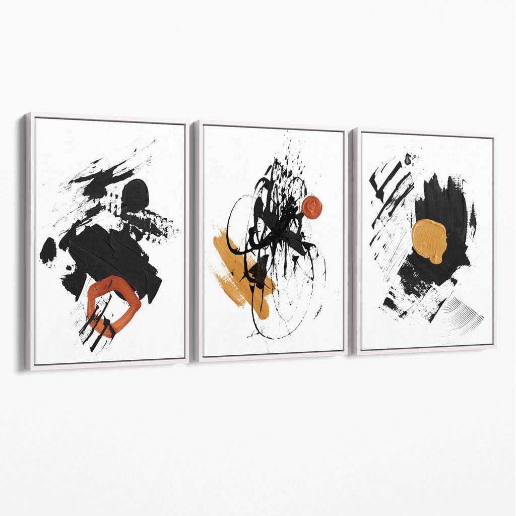 Abstrakt sett med 3 minimalistiske lerretsmalerier i svart, gult og oransje