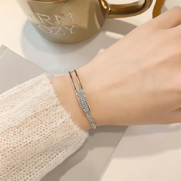 Skanto | Åpen armbånd laget av 925 sterling sølv med zirkonia
