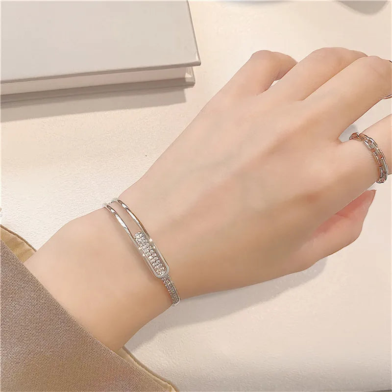 Skanto | Åpen armbånd laget av 925 sterling sølv med zirkonia