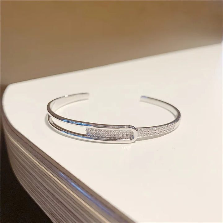 Skanto | Åpen armbånd laget av 925 sterling sølv med zirkonia