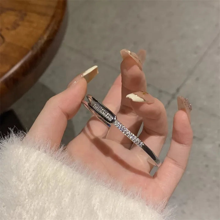 Skanto | Åpen armbånd laget av 925 sterling sølv med zirkonia