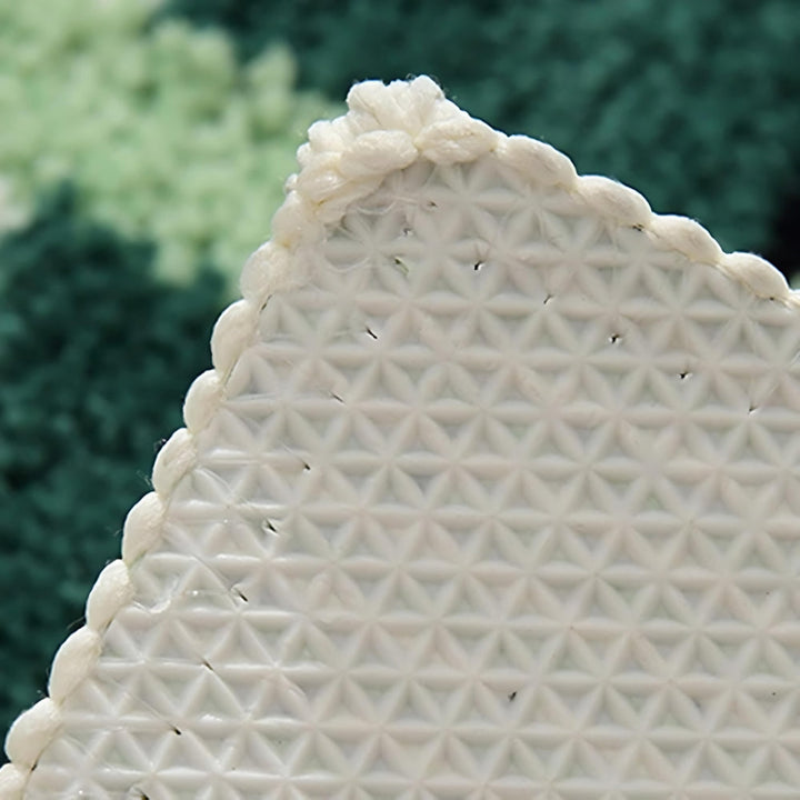Skanto | Mos grønne geometriske flock bade matte