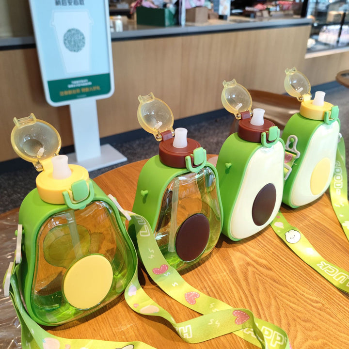Dame kreativ Avocado-drikkeflaske med bærelabel Skanto