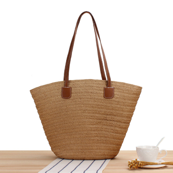 Elegant shoulder bag made of natural raffia with high-quality leather accents Skanto
