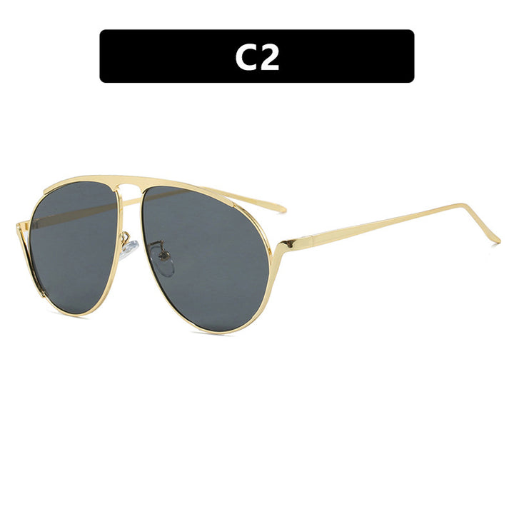 Dame moteriktig pilot-solbrille med polariserte linser og elegant metallramme Skanto