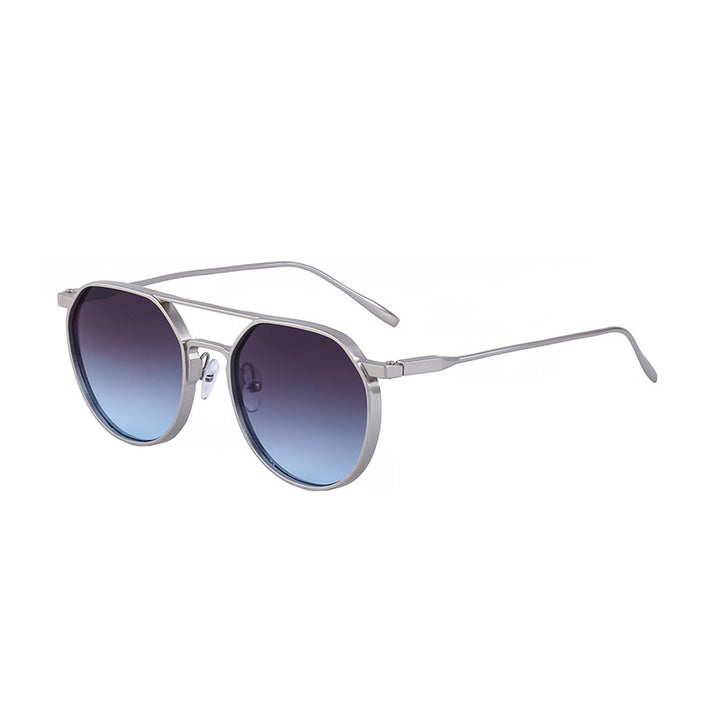 Dame moterik solbrille i stilfullt rundt design Skanto