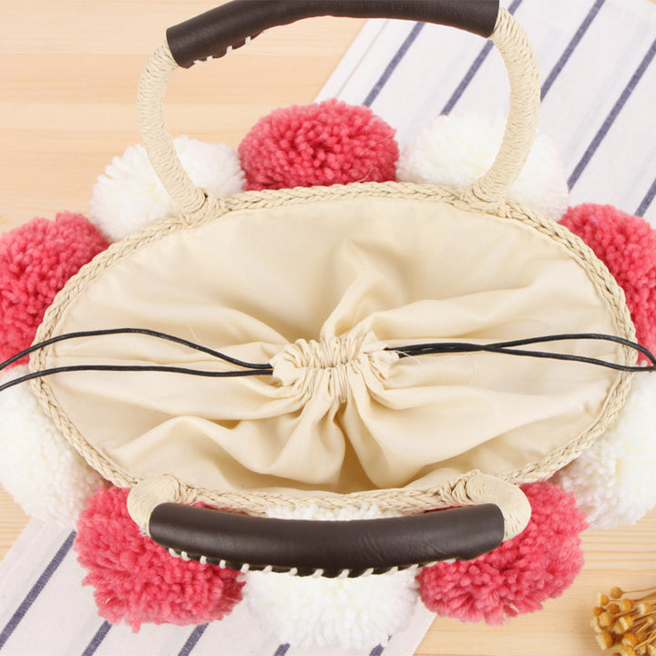 Basket bag with pompom decorated top Skanto