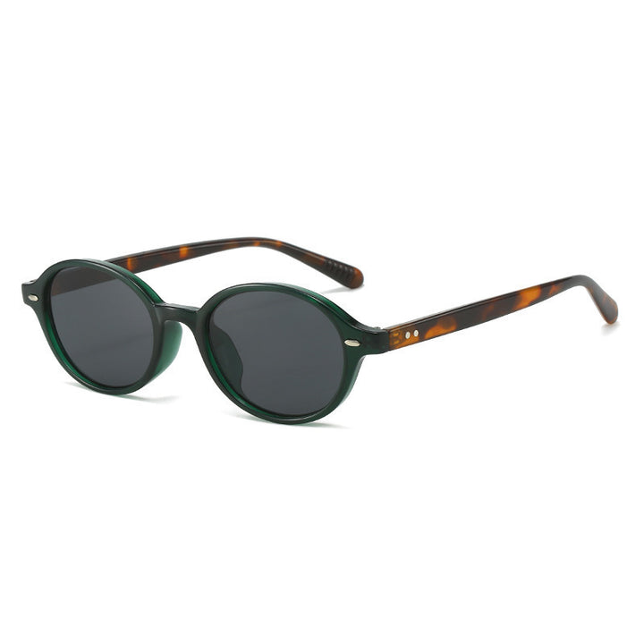 Dame modische solbrille i elegant ovaldesign Skanto