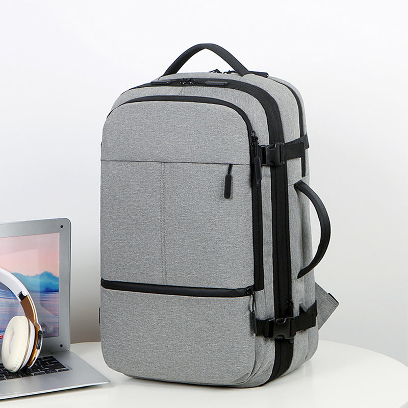 Praktisk laptopsekk med flere rom og innovativ organisering Skanto