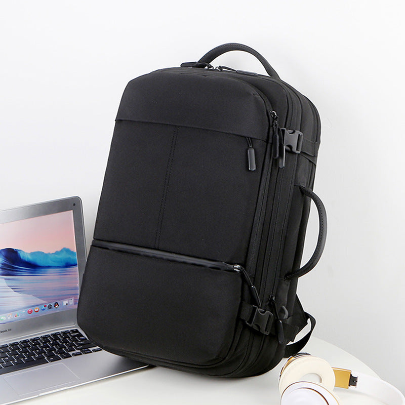 Praktisk laptopsekk med flere rom og innovativ organisering Skanto