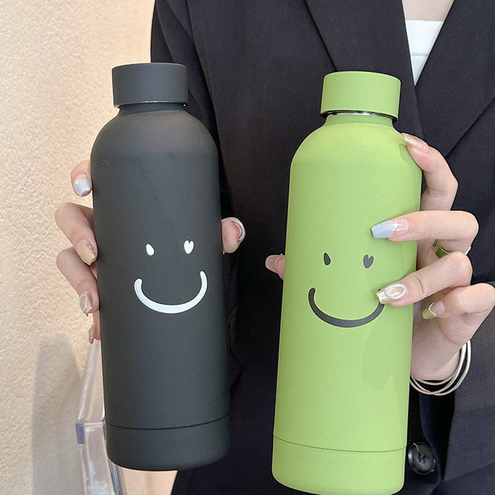Damen Isolierflasche med innovativt smilmotiv Skanto