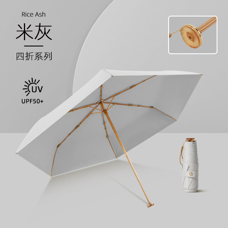 Damer UV-beskyttelsesparaply med elegant vindbeskyttelse Skanto