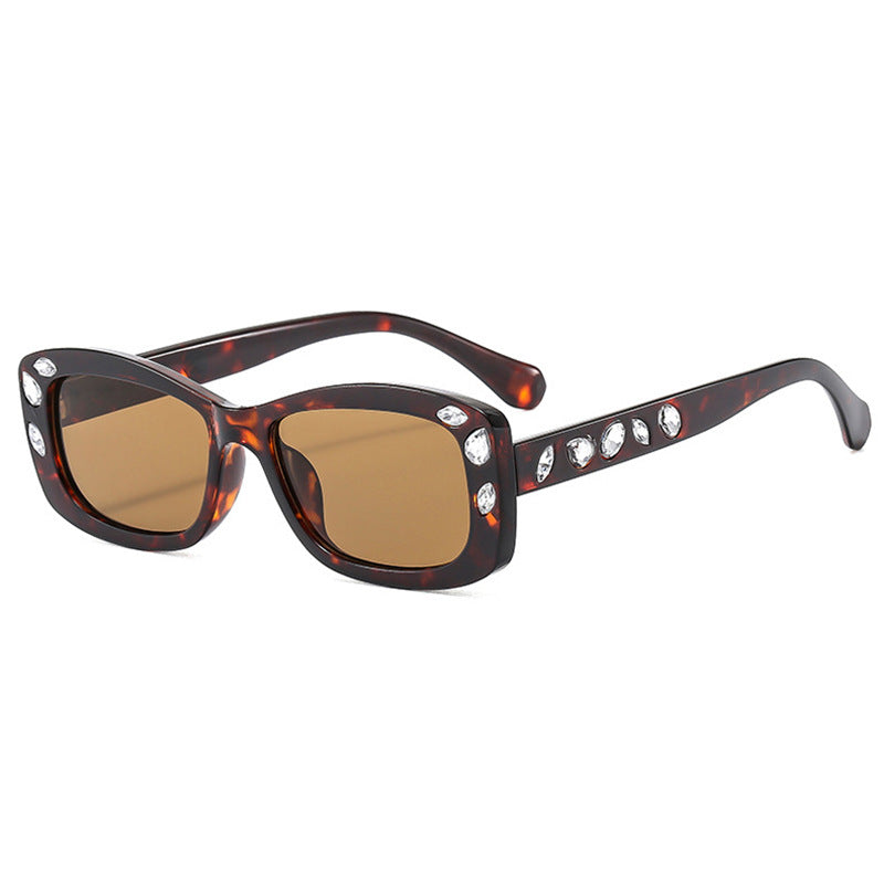 Dame moteriktig solbrille med krystallpynt Skanto