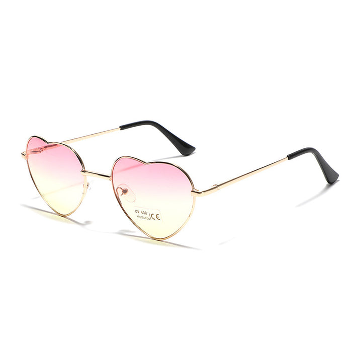 Dame hjerteformet solbrille med UV-beskyttelse og delikat ramme Skanto