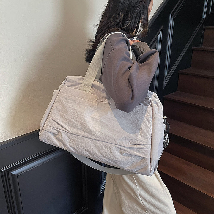 Elegant og romslig sport crossover bag Skanto