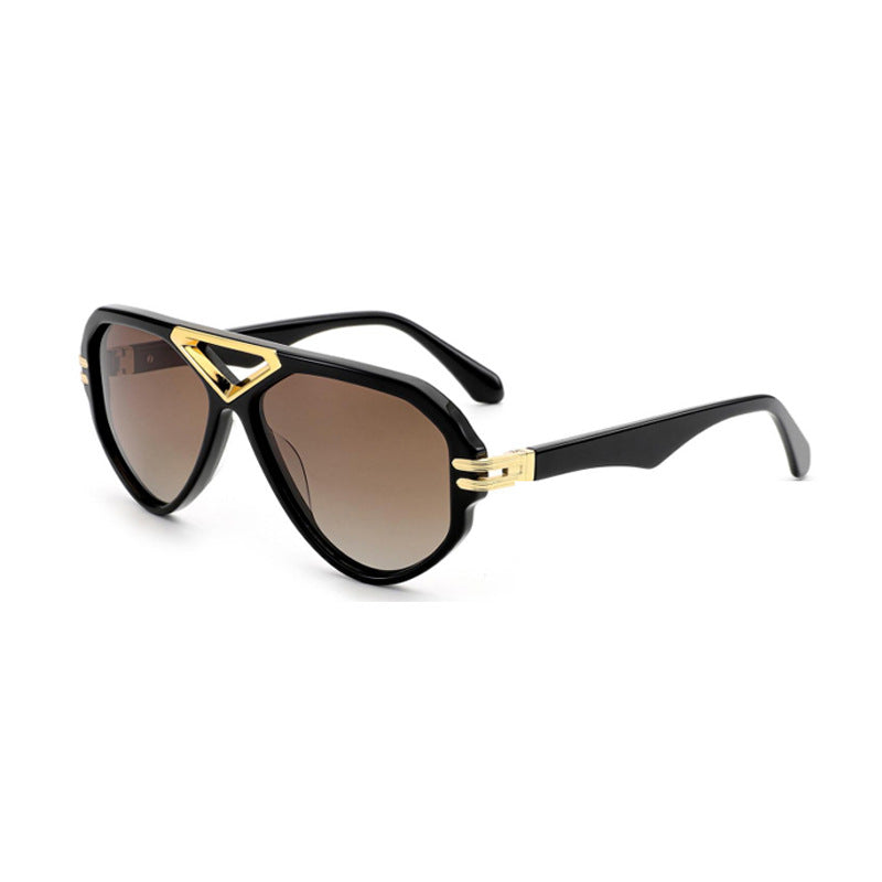 Damer elegant solbrille med markant ramme Skanto