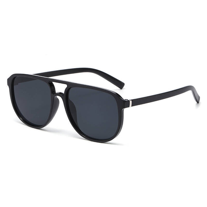 Dame moteriktig solbrille i elegant kvadratdesign Skanto