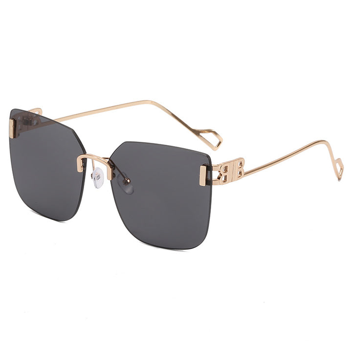 Dame elegant firkantet solbrille med gullfarget metalramme Skanto