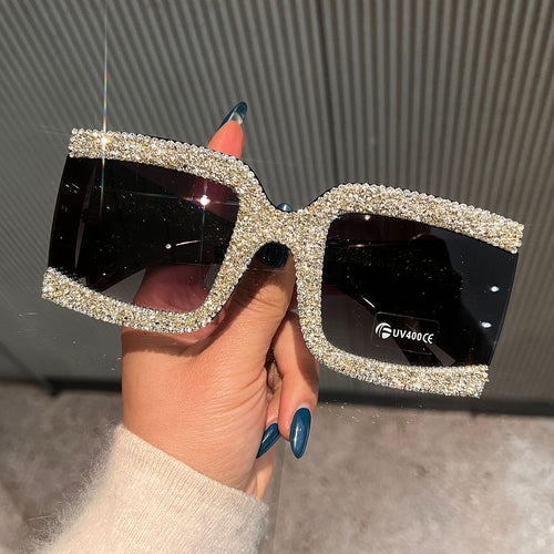 Dame solbrille med strassdekorert ramme Skanto