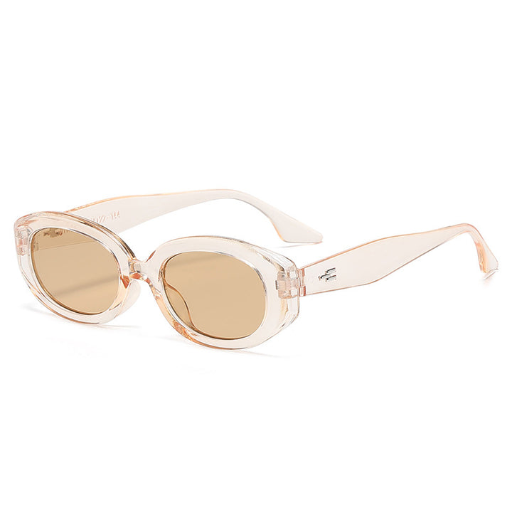 Dame moteriktig solbrille med moderne, oval ramme Skanto