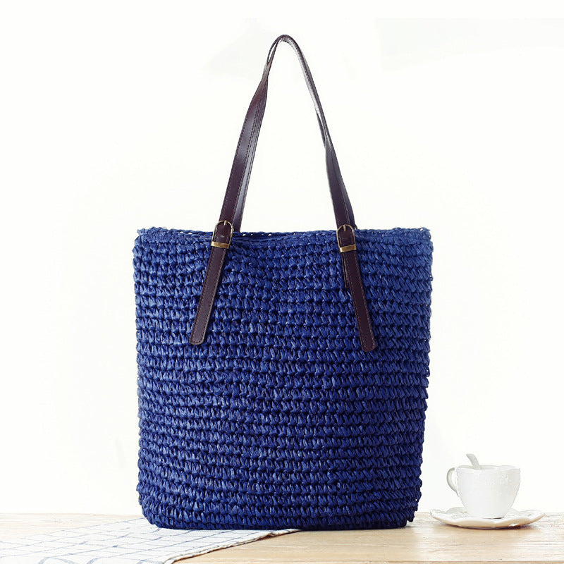 Handbag made of handmade natural material with sturdy leather handles Skanto