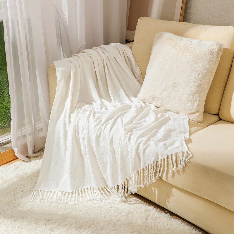 Kvinnelig elegant og stilfull sofa teppe med frynser Skanto