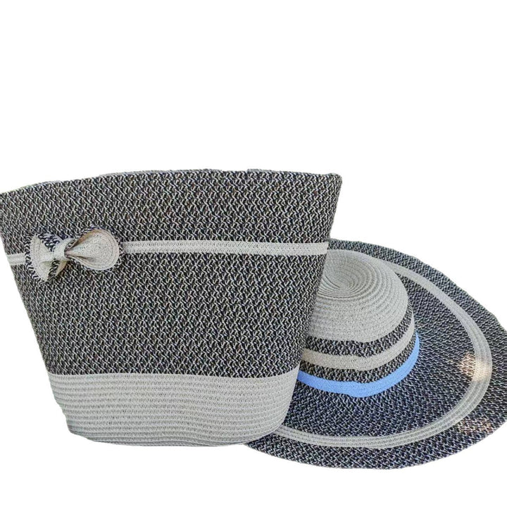 Elegante solhatt med bred brem og diskret stripemønster Skanto