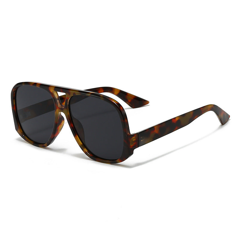 Dame trendy oversized solbriller i moderne skilpaddemønster Skanto