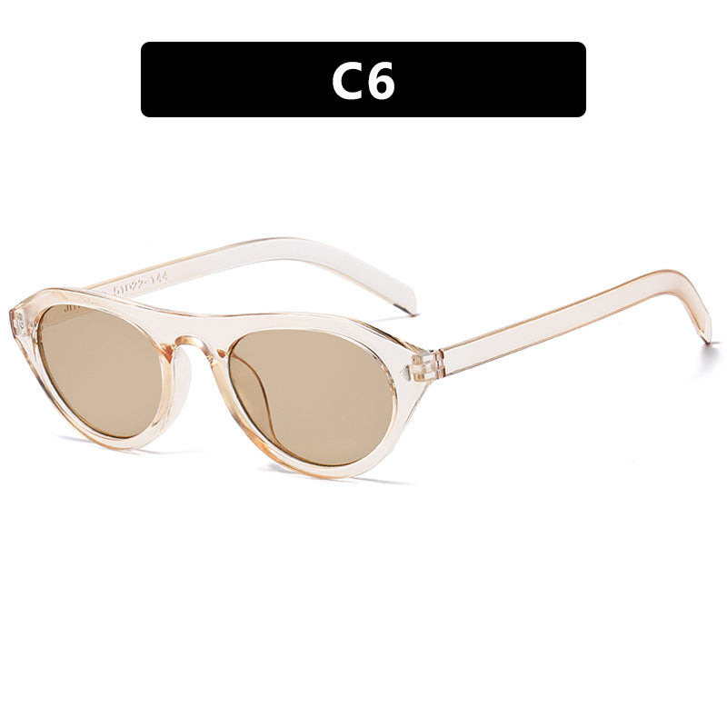 Dames moteriktig solbrille med buet ramme og beskyttende UV-filter Skanto
