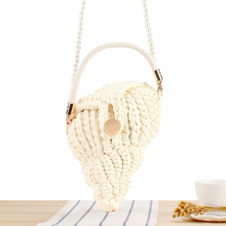 Elegant håndveske i muslingdesign Skanto