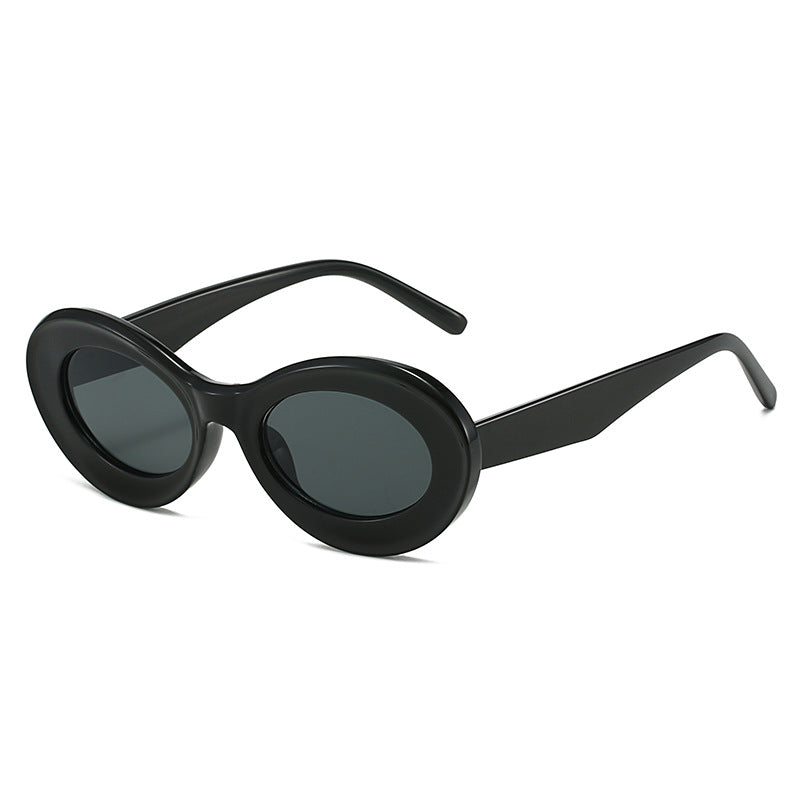 Dame moteriktig solbrille i oval design Skanto