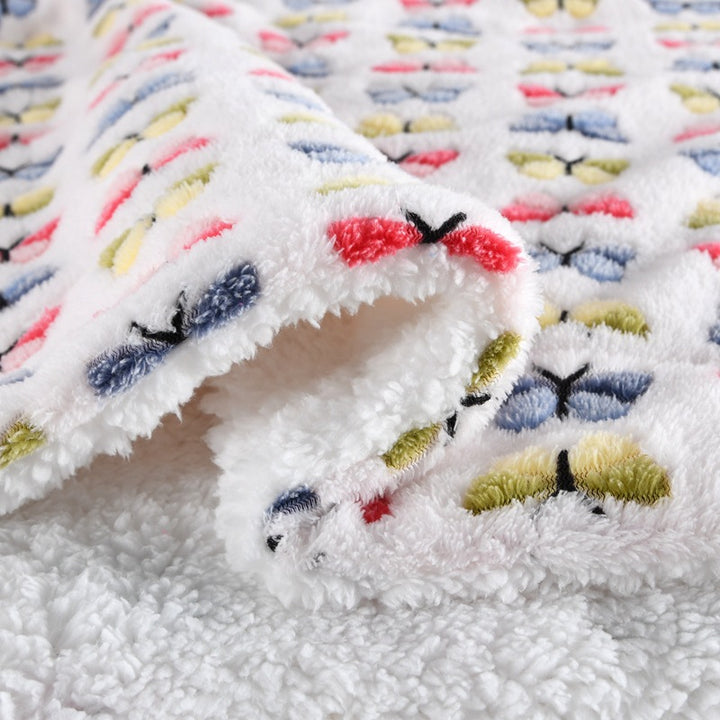Damer Fleece-kosedekken med vendbart design Skanto