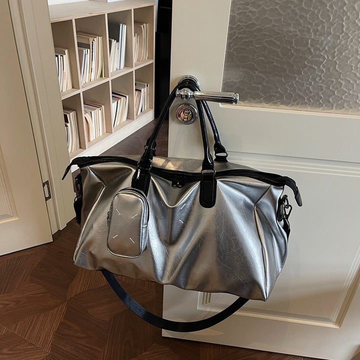 Elegant reiseveske i høykvalitets kunstlær Skanto