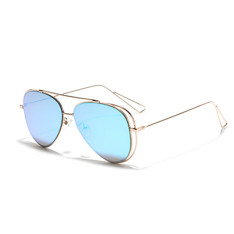 Dame Retro-flyger solbrille med sølvfarget metallramme og speilglass Skanto