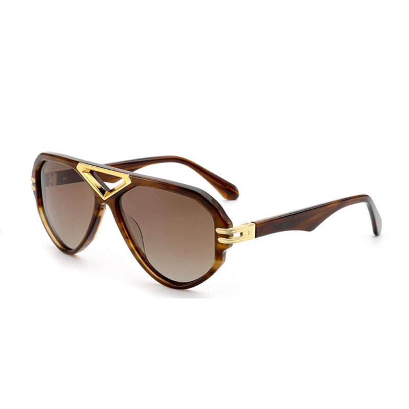 Damer elegant solbrille med markant ramme Skanto