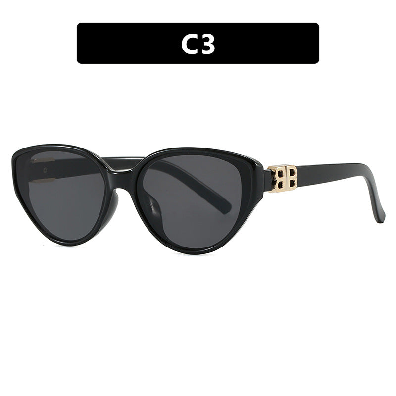 Dame modische Cat-Eye solbriller med elegant metallramme og UV-beskyttelse Skanto