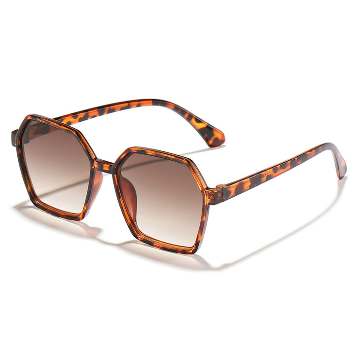Dame elegant solbrille i moderne hexagon-design Skanto
