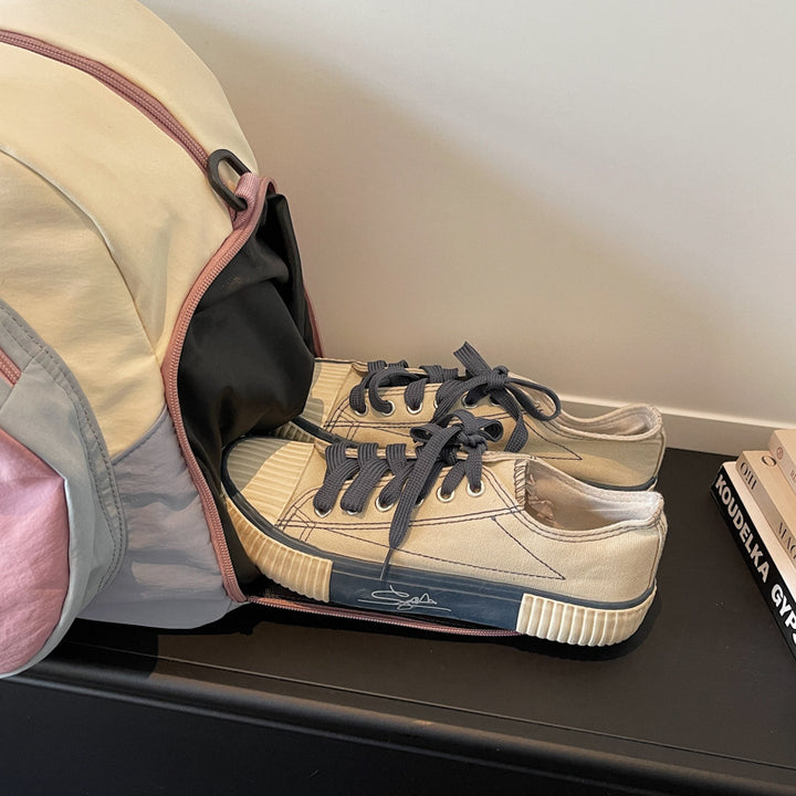Sporty bæreveske med innovativt fane-system Skanto