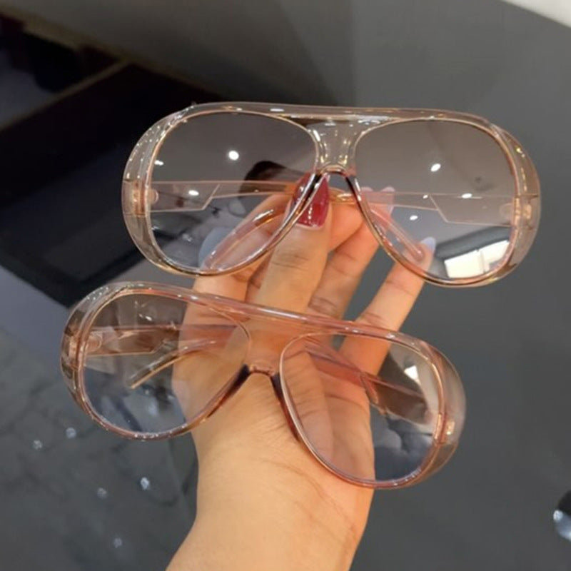 Dame sporty solbriller i futuristisk design Skanto