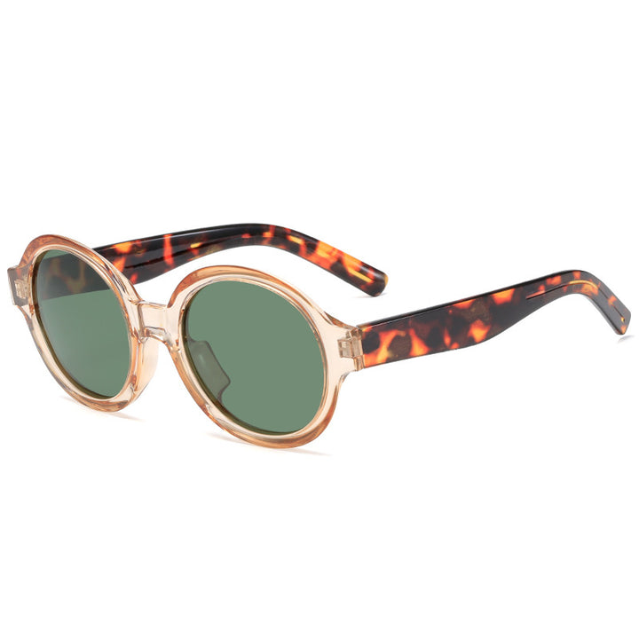 Dame moteriktig solbrille i stilfullt rundt design Skanto