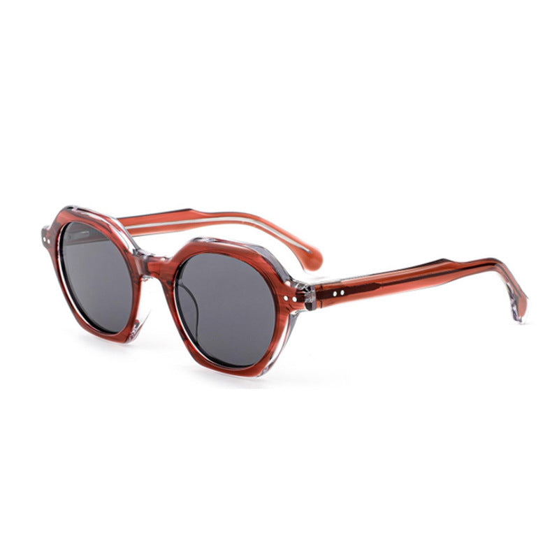 Dame solbrille i stilfull, sekskantet design med robust ramme og UV-beskyttelse Skanto